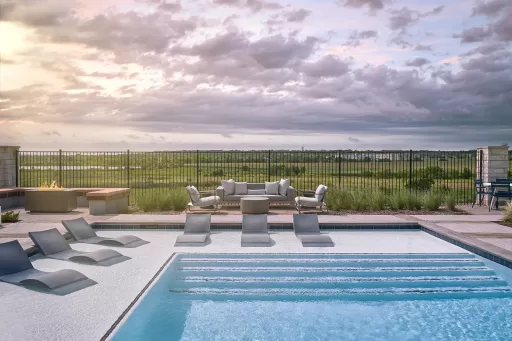 Outdoor pool with lounge seating